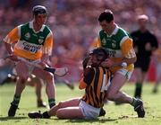 13 September 1998; PJ Delaney of Kilkenny in action against Kevin Kinahan, right, and Hubert Rigney of Offaly during the Guinness All-Ireland Senior Hurling Championship Final match between Kilkenny and Offaly at Croke Park in Dublin. Photo by Ray McManus/Sportsfile