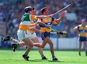 9 August 1998; PJ O'Connell of Clare in action against Johnny Pilkington, behind, and Hubert Rigney of Offaly during the Guinness All-Ireland Senior Hurling Championship Semi-Final match between Clare and Offaly at Croke Park in Dublin. Photo by Ray McManus/Sportsfile