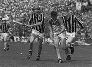 25 July 1982; Padraig Horan of Offaly in action against John Henderson, left, and Brian Cody of Kilkenny during the Leinster Senior Hurling Championship Final match between Kilkenny and Offaly at Croke Park in Dublin.