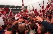 27 September1998; Niall Finnegan of Galway celebrates with supporters on the pitch after the Bank of Ireland All-Ireland Senior Football Championship Final match between Kildare and Galway at Croke Park in Dublin. Photo by David Maher/Sportsfile