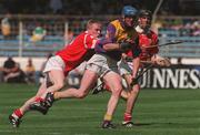 9 August 1998; Nicky Lambert of Wexford is tackled by Donal Broderick of Cork during the All-Ireland Minor Hurling Championship Semi-Final match between Cork and Wexford at Croke Park in Dublin. Photo by Brendan Moran/Sportsfile