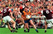 1 August 1998;  Ray Lannon of Roscommon in action against Seán Ó Domhnaill, behind, Ray Silke, left, and Kevin Walshe of Galway, right, during the Bank of Ireland Connacht Senior Football Championship Final Replay match between Galway and Roscommon at Dr Hyde Park in Roscommon. Photo by Matt Browne/Sportsfile