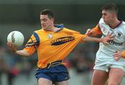 10 October 1998; Senan Connell of Na Fianna is tackled by Johnny Magee of Kilmacud Crokes during the Dublin Senior Club Football Championship Final at Parnell Park in Dublin. Photo by David Maher/Sportsfile