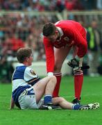 27 September 1998; Tyrone goalkeeper Pascal McConnell consoles Brian McDonald of Laois after the All-Ireland Minor Football Championship Final between Laois and Tyrone at Croke Park in Dublin. Photo by Matt Browne/Sportsfile