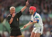 16 August 1998; Referee Pat O'Connor with Stephen Frampton of Waterford during the Guinness All-Ireland Senior Hurling Championship Semi-Final match between Kilkenny and Waterford at Croke Park in Dublin. Photo by Matt Browne/SPORTSFILE