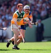 9 August 1998; Simon Whelahan of Offaly in action against Ger O'Loughlin of Clare during the Guinness All-Ireland Senior Hurling Championship Semi-Final match between Clare and Offaly at Croke Park in Dublin. Photo by Brendan Moran/Sportsfile