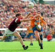 1 August 1998; Tom Ryan of Roscommon in action against Michael Donnellan of Galway during the Bank of Ireland Connacht Senior Football Championship Final Replay match between Galway and Roscommon at Dr Hyde Park in Roscommon. Photo by Matt Browne/Sportsfile