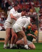 2 August 1998; Tommy Dowd, Meath, in a tussle with Kildare players from left, Glenn Ryan, Ronan Quinn and Anthony Rainbow during the Bank of Ireland Leinster Senior Football Championship Final match between Kildare and Meath at Croke Park in Dublin. Photo by David Maher/Sportsfile