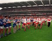 27th September 1998; Laois players applaud the Tyrone players off the field after the All-Ireland Minor Football Championship Final between Laois and Tyrone at Croke Park in Dublin. Photo by Brendan Moran/Sportsfile