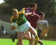 2 June 2002; Graham Geraghty of Meath in action against Westmeath's David Mitchell, centre, and Fergal Murray during the Bank of Ireland Leinster Senior Football Championship Quarter-Final match between Meath and Westmeath at O'Moore Park in Portlaoise, Laois. Photo by Matt Browne/Sportsfile
