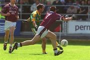 2 June 2002; Meath's Evan Kelly in action against Westmeath's John Keane during the Bank of Ireland Leinster Senior Football Championship Quarter-Final match between Meath and Westmeath at O'Moore Park in Portlaoise, Laois. Photo by Matt Browne/Sportsfile