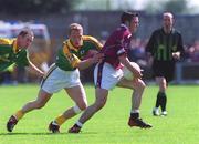 2 June 2002; Fergal Murray of Westmeath in action against Meath's Graham Geraghty during the Bank of Ireland Leinster Senior Football Championship Quarter-Final match between Meath and Westmeath at O'Moore Park in Portlaoise, Laois. Photo by Matt Browne/Sportsfile