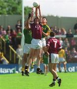 2 June 2002; Rory O'Connell of Westmeath, contests a high ball against Evan Kelly, left, and John Cullinane of Meath during the Bank of Ireland Leinster Senior Football Championship Quarter-Final match between Meath and Westmeath at O'Moore Park in Portlaoise, Laois. Photo by Matt Browne/Sportsfile