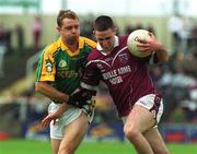2 June 2002; Fergal Wilson of Westmeath in action against Meath's Cormac Murphy during the Bank of Ireland Leinster Senior Football Championship Quarter-Final match between Meath and Westmeath at O'Moore Park in Portlaoise, Laois. Photo by Pat Murphy/Sportsfile