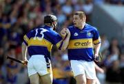 2 June 2002; John Carroll of Tipperary celebrates scoring his side's goal with team-mate Eoin Kelly during the Guinness Munster Senior Hurling Championship Semi-Final match between Tipperary and Limerick at Páirc U’ Chaoimh in Cork. Photo by Brendan Moran/Sportsfile