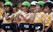 3 June 2002; Local school children watch during a Republic of Ireland training session in Chiba, Japan. Photo by David Maher/Sportsfile
