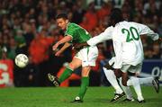 16 May 2002; Mark Kinsella of Republic of Ireland in action against Wilson Oruma of Nigeria during the International Friendly match between Republic of Ireland and Nigeria at Lansdowne Road in Dublin. Photo by David Maher/Sportsfile