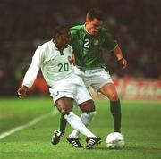 16 May 2002; Wilson Oruma of Nigeria in action against the Republic of Ireland's Steve Finnan during the International Friendly match between Republic of Ireland and Nigeria at Lansdowne Road in Dublin. Photo by Damien Eagers/Sportsfile