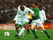 16 May 2002; Taribo West of Nigeria in action against the Republic of Ireland's Robbie Keane during the International Friendly match between Republic of Ireland and Nigeria at Lansdowne Road in Dublin. Photo by Damien Eagers/Sportsfile