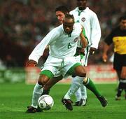 16 May 2002; Taribo West of Nigeria in action against the Republic of Ireland's Robbie Keane during the International Friendly match between Republic of Ireland and Nigeria at Lansdowne Road in Dublin. Photo by Damien Eagers/Sportsfile