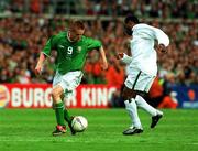 16 May 2002; Damien Duff of Republic of Ireland in action against Isaac Okoronkwo of Nigeria during the International Friendly match between Republic of Ireland and Nigeria at Lansdowne Road in Dublin. Photo by Damien Eagers/Sportsfile