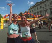 3 June 2002; Donegal girls Ita O'Sullivan, left, from Leterkenny and Tina McGeoghegan, from Carndonagh after finishing the Tesco Evening Herald Women's Mini Marathon in Dublin. Photo by Ray McManus/Sportsfile