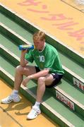 4 June 2002; Steve Staunton sits on steps outside the training ground following a Republic of Ireland Training Session in Chiba, Japan, ahead of their Group E match against Germany, where he will earn his 100th cap. Photo by David Maher/Sportsfile