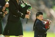 2 June 2002; Six year old Mark Broderick plays the bagpipes with the Castlelyons Pipe Band during the Guinness Munster Senior Hurling Championship Semi-Final match between Tipperary and Limerick at Páirc U’ Chaoimh in Cork. Photo by Brendan Moran/Sportsfile