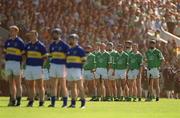2 June 2002; Limerick and Tipperary players stand for the National Anthem during the Guinness Munster Senior Hurling Championship Semi-Final match between Tipperary and Limerick at Páirc U’ Chaoimh in Cork. Photo by Brendan Moran/Sportsfile