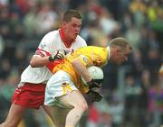 2 June 2002; Enda McLernon of Antrim in action against Derry's Gavin Diamond during the Bank of Ireland Ulster Senior Football Championship Quarter-Final match between Antrim and Derry at Casement Park in Belfast. Photo by Brian Lawless/Sportsfile