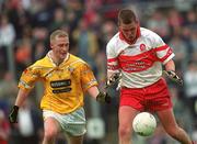 2 June 2002; Gavin Diamond of Derry in action against Enda McLernon of Antrim during the Bank of Ireland Ulster Senior Football Championship Quarter-Final match between Antrim and Derry at Casement Park in Belfast. Photo by Brian Lawless/Sportsfile