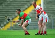 25 May 2002; Derry goal-keeper Ciaran Stevenson defends the goal with team-mate Gregory Biggs during the Guinness Ulster Senior Hurling Championship Semi-Final match between Down and Derry at Casement Park in Belfast. Photo by Damien Eagers/Sportsfile