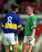 2 June 2002; Limerick's Ciaran Carey shakes hands with Tipperary's Thomas Dunne following the Guinness Munster Senior Hurling Championship Semi-Final match between Tipperary and Limerick at Páirc Uí Chaoimh in Cork. Photo by Brendan Moran/Sportsfile