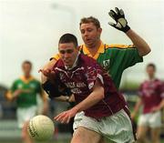 2 June 2002; Fergal Wilson of Westmeath in action against Cormac Murphy of Meath during the Bank of Ireland Leinster Senior Football Championship Quarter-Final match between Meath and Westmeath at O'Moore Park in Portlaoise, Laois. Photo by Pat Murphy/Sportsfile