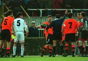 2 April 1997; Denis Irwin of Republic of Ireland remonstrate with referee Alfredo Trentalange as he shows a red card to Jason McAteer during the FIFA World Cup 1998 Group 8 Qualifier match between FYR Macedonia and Republic of Ireland at the City Stadium in Skopje, FYR Macedonia. Photo by David Maher/Sportsfile