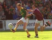 2 June 2002; Graham Geraghty of Meath in action against Westmeath's John Keane during the Bank of Ireland Leinster Senior Football Championship Quarter-Final match between Meath and Westmeath at O'Moore Park in Portlaoise, Laois. Photo by Matt Browne/Sportsfile