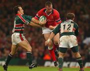 25 May 2002; John O'Neill of Munster is tackled by Austin Healey, left, and Rod Kafer of  Leicester Tigers during the Heineken Cup Final match between Leicester Tigers and Munster at the Millennium Stadium in Cardiff, Wales. Photo by Brendan Moran/Sportsfile