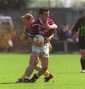 2 June 2002; Fergal Murray of Westmeath in action against Graham Geraghty of Meath during the Bank of Ireland Leinster Senior Football Championship Quarter-Final match between Meath and Westmeath at O'Moore Park in Portlaoise, Laois. Photo by Matt Browne/Sportsfile