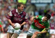 2 June 2002; Michael Donnellan of Galway in action against Aiden Higgins of Mayo during the Bank of Ireland Connacht Senior Football Championship Semi-Final match between Mayo and Galway at MacHale Park in Castlebar, Mayo. Photo by Ray McManus/Sportsfile