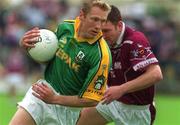 2 June 2002; Graham Geraghty of Meath in action against Westmeath's David Mitchell during the Bank of Ireland Leinster Senior Football Championship Quarter-Final match between Meath and Westmeath at O'Moore Park in Portlaoise, Laois. Photo by Matt Browne/Sportsfile