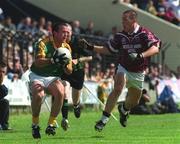 2 June 2002; Evan Kelly of Meath in action against Westmeath's John Keane during the Bank of Ireland Leinster Senior Football Championship Quarter-Final match between Meath and Westmeath at O'Moore Park in Portlaoise, Laois. Photo by Matt Browne/Sportsfile