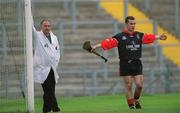 25 May 2002; Goal-keeper Graham Clarke of Down signals a wide during the Guinness Ulster Senior Hurling Championship Semi-Final match between Down and Derry at Casement Park in Belfast. Photo by Damien Eagers/Sportsfile