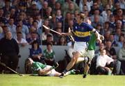 2 June 2002; Brian O'Meara of Tipperary in action against Ciaran Carey of Limerick during the Guinness Munster Senior Hurling Championship Semi-Final match between Tipperary and Limerick at Páirc U’ Chaoimh in Cork. Photo by Brendan Moran/Sportsfile