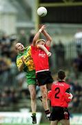 2 June 2002; Brendan Coulter of Down in action against Paul McGonigle of Donegal during the Bank of Ireland Ulster Senior Football Championship Quarter-Final match between Donegal and Down at MacCumhail Park in Ballybofey, Donegal. Photo by Damien Eagers/Sportsfile