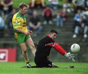 2 June 2002; Brian Roper of Donegal shoots to score his side's second goal, past Down goalkeeper Peter Travers, during the Bank of Ireland Ulster Senior Football Championship Quarter-Final match between Donegal and Down at MacCumhail Park in Ballybofey, Donegal. Photo by Damien Eagers/Sportsfile