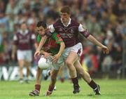 2 June 2002; Kieran Fitzgerald of Galway in action against Conor Mortimer of Mayo during the Bank of Ireland Connacht Senior Football Championship Semi-Final match between Mayo and Galway at MacHale Park in Castlebar, Mayo. Photo by Ray McManus/Sportsfile