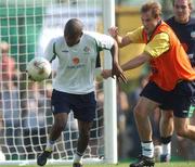 7 June 2002; Clinton Morrison, left, and Jason McAteer during a game of Gaelic Football during a Republic of Ireland training session in Chiba, Japan. Photo by David Maher/Sportsfile