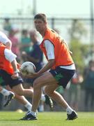 7 June 2002; Niall Quinn during a game of Gaelic Football during a Republic of Ireland training session in Chiba, Japan. Photo by David Maher/Sportsfile