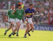 2 June 2002; Brian O'Meara of Tipperary in action against Barry Foley of Limerick during the Guinness Munster Senior Hurling Championship Semi-Final match between Tipperary and Limerick at Páirc U’ Chaoimh in Cork. Photo by Brendan Moran/Sportsfile