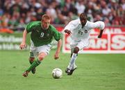 16 May 2002; Damien Duff of Republic of Ireland in action against Femi Opabunmi of Nigeria during the International Friendly match between Republic of Ireland and Nigeria at Lansdowne Road in Dublin. Photo by Matt Browne/Sportsfile